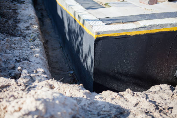 Professional Waterproofing technician working in Wilder, KY